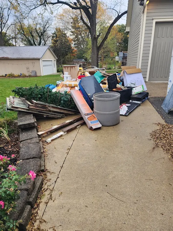 Dumpster being loaded with debris for 3 Yard Dumpster Rental in Ridgefield Park village